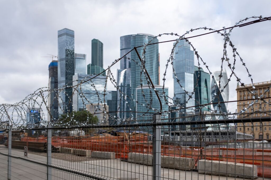 Commercial chain link security fence with barbed wire