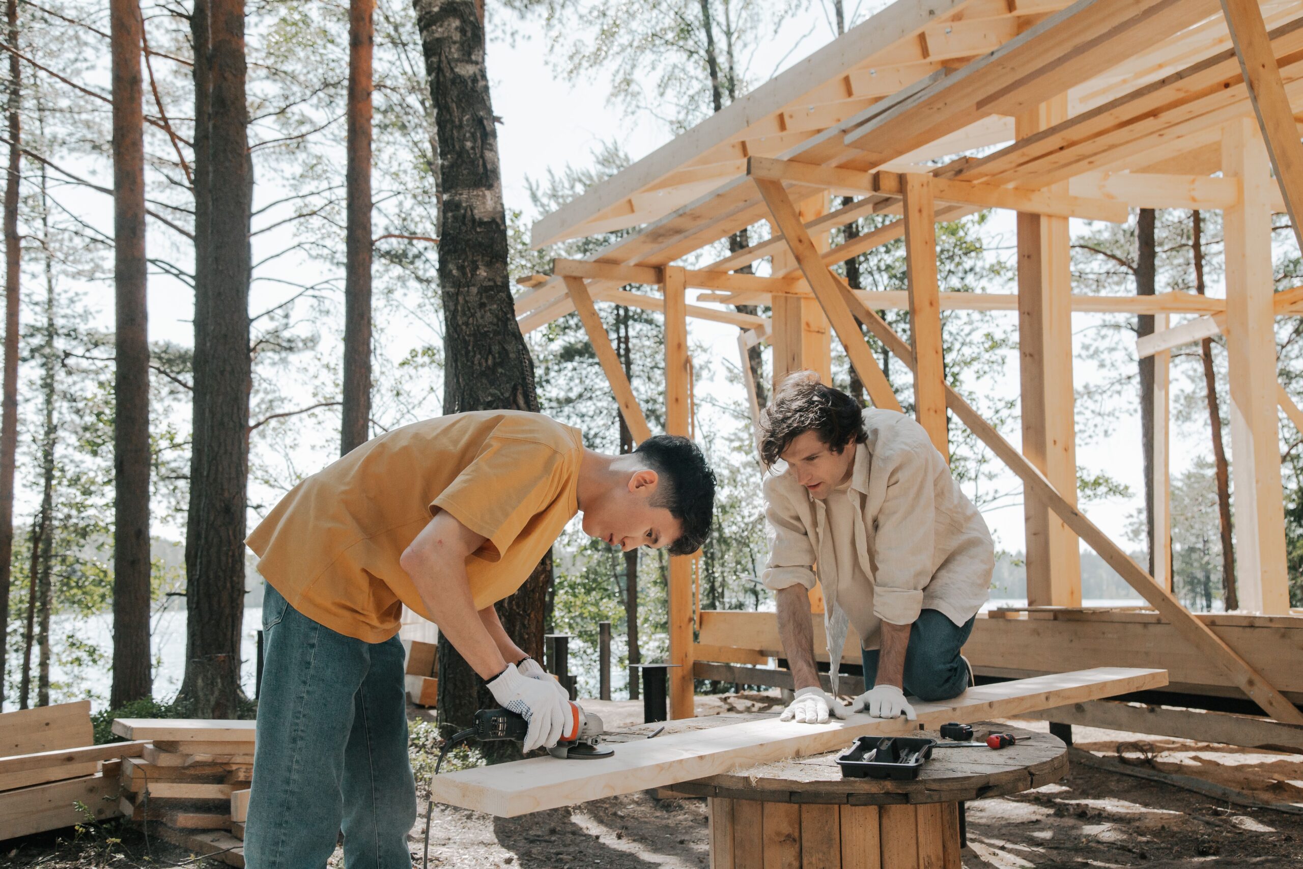Workers installing fence and outdoor structures