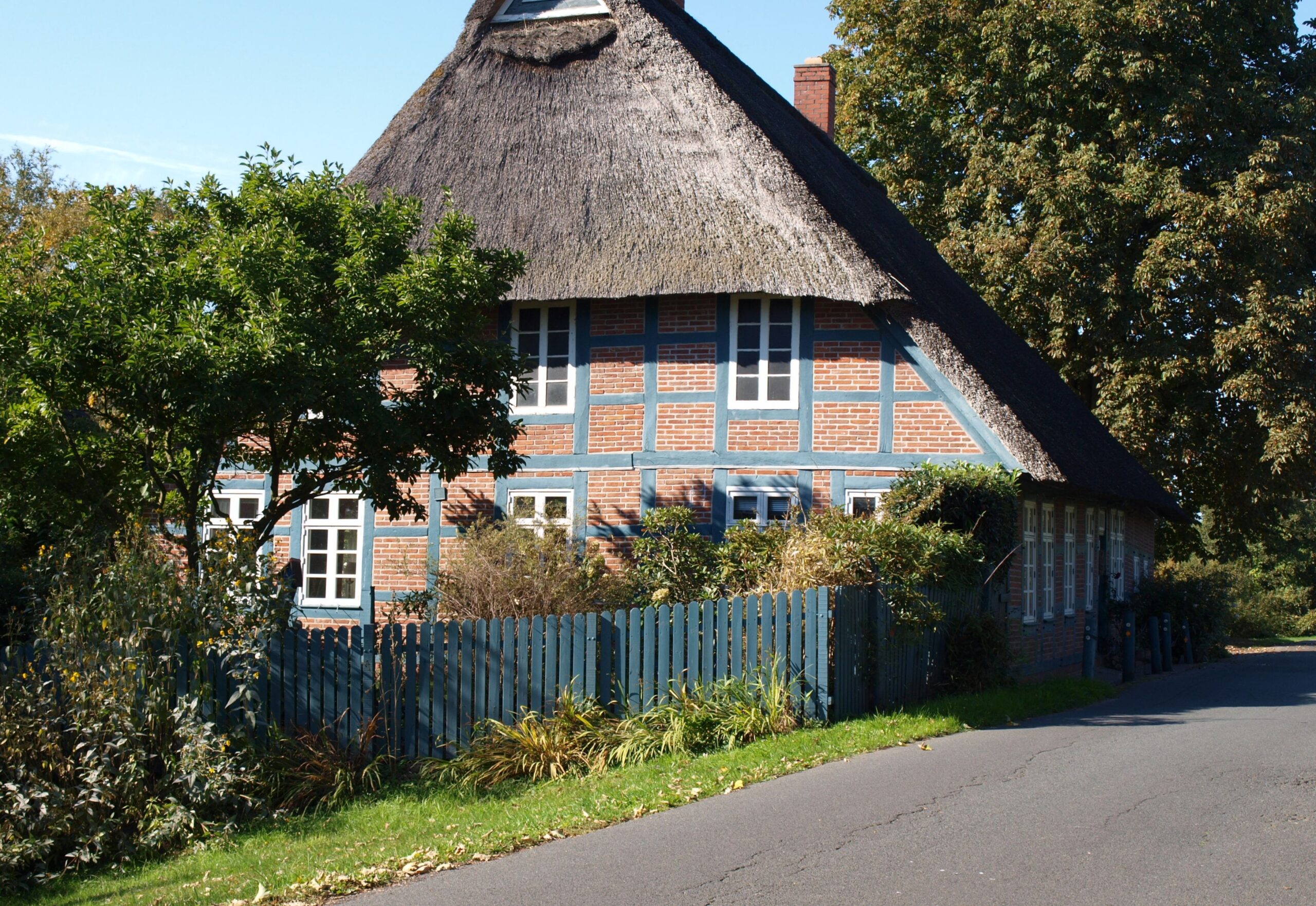 Residential property protected by a wooden fence